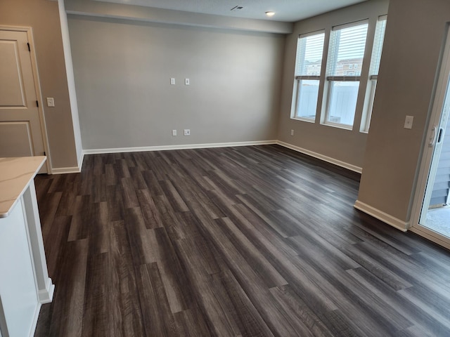 interior space with dark wood-type flooring