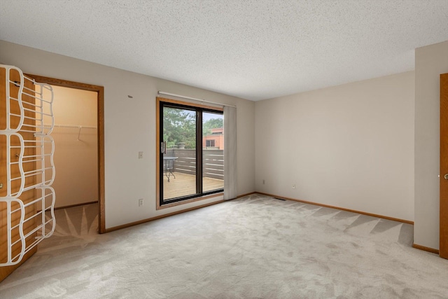 interior space featuring a textured ceiling