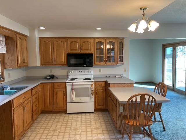 kitchen with sink, a chandelier, decorative light fixtures, and white electric stove