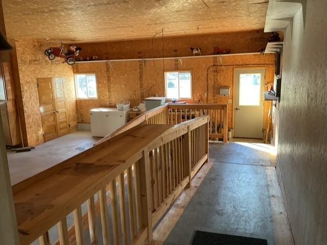 basement featuring an inviting chandelier