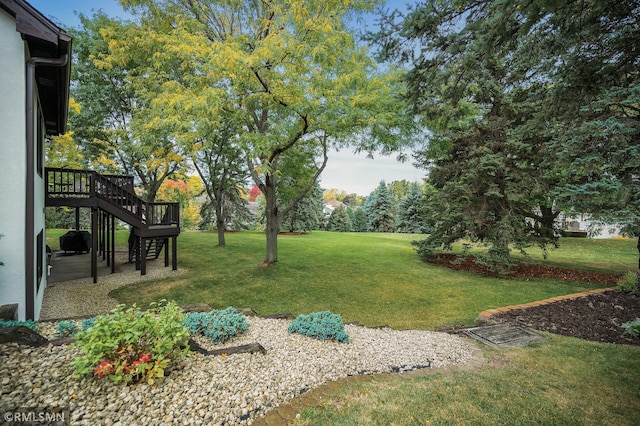 view of yard featuring a deck