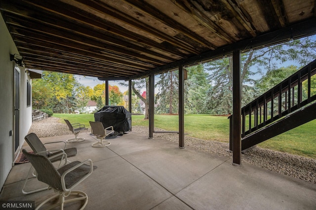 view of patio featuring a grill