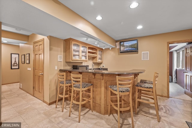 bar with dark stone counters