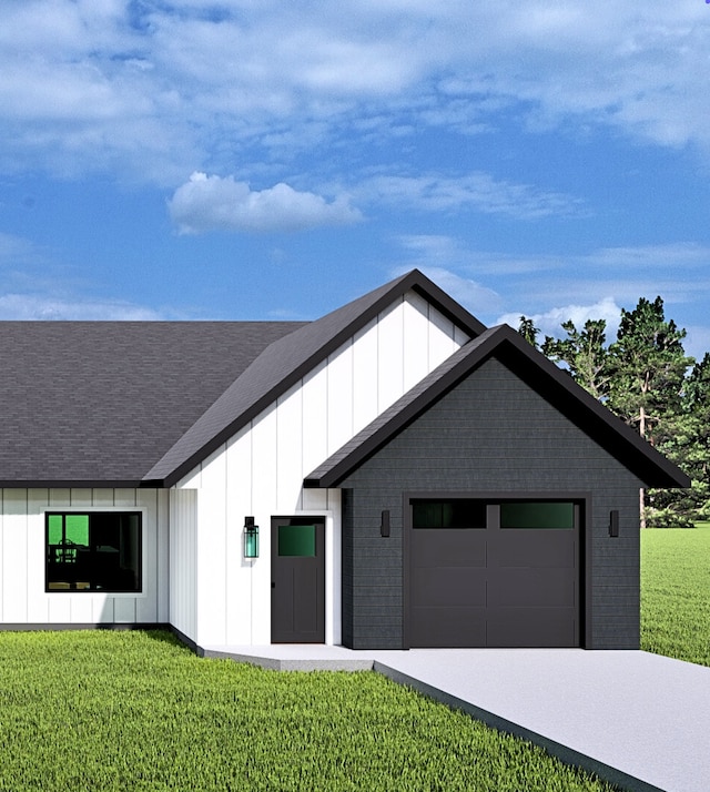 exterior space featuring a front yard and a garage