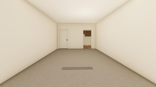 empty room with carpet flooring