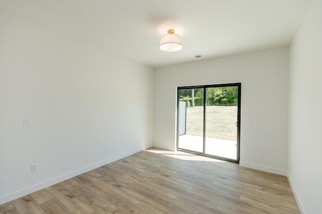 100 3rd Ave, Pelican Rapids, MN 56572 - spare room with light wood-style floors and baseboards