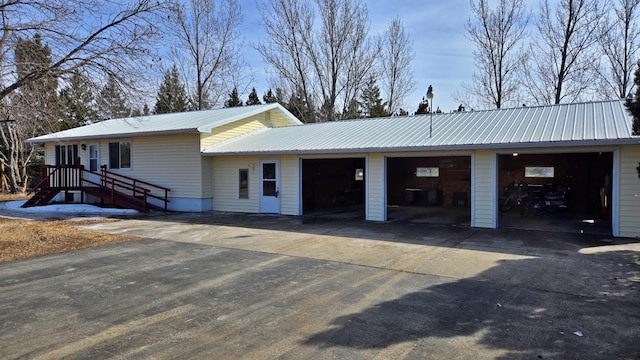 view of front of home featuring metal roof