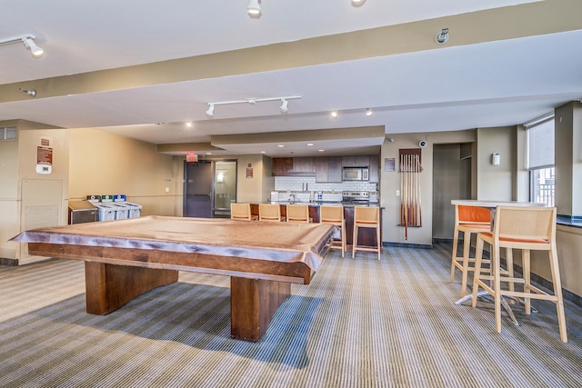 rec room with light colored carpet and pool table