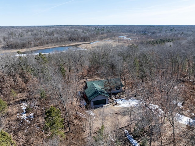 aerial view with a water view and a view of trees