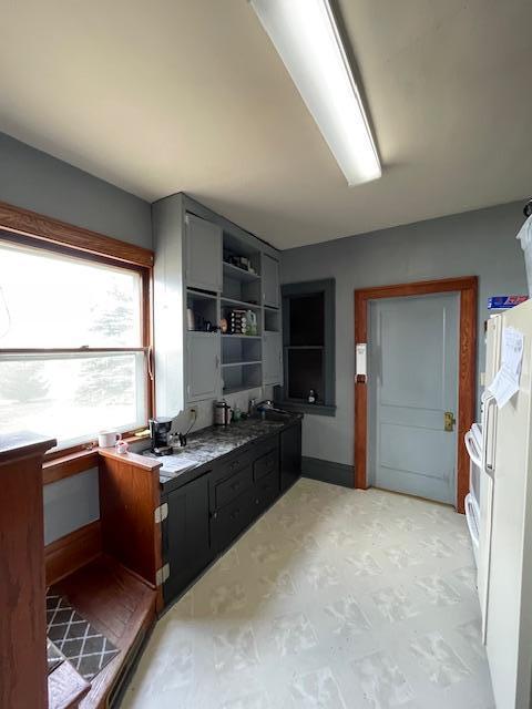 kitchen featuring white fridge