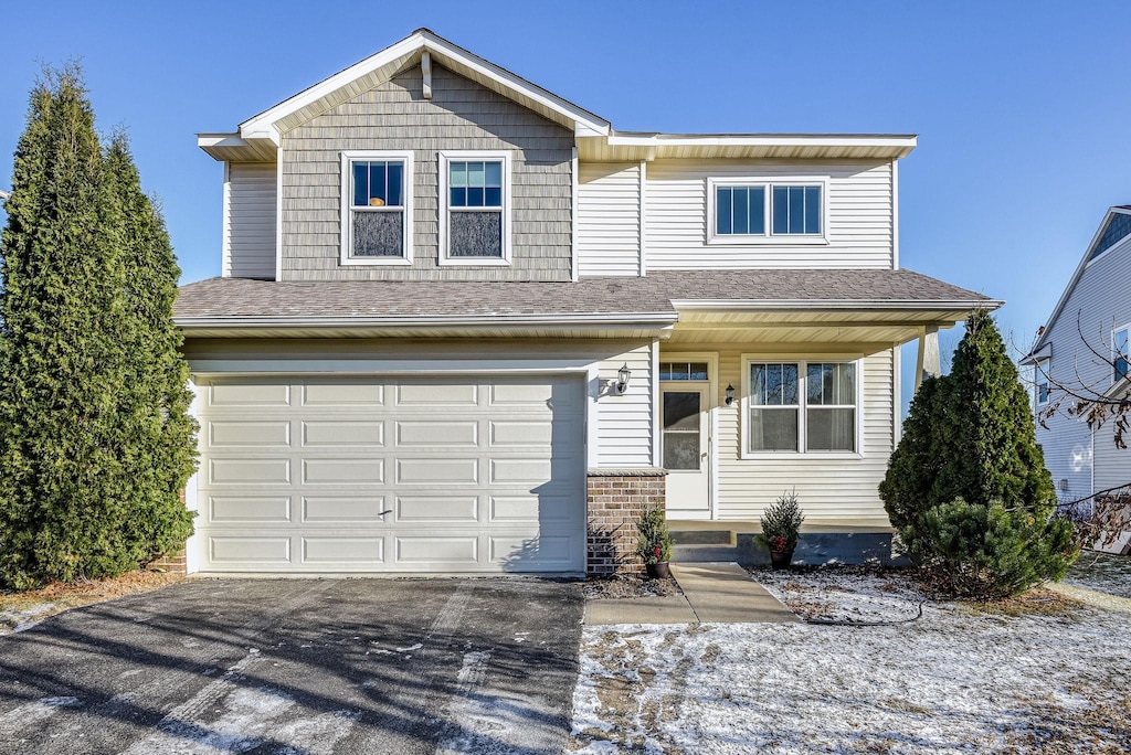 view of front of property with a garage