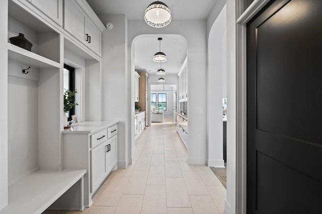 mudroom with light tile patterned floors