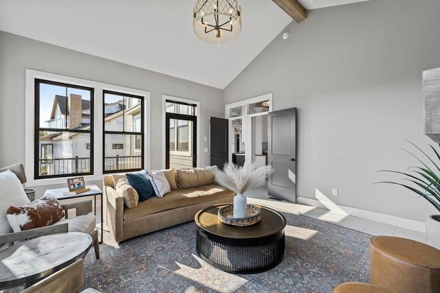 living room with tile patterned floors, a notable chandelier, beam ceiling, and high vaulted ceiling