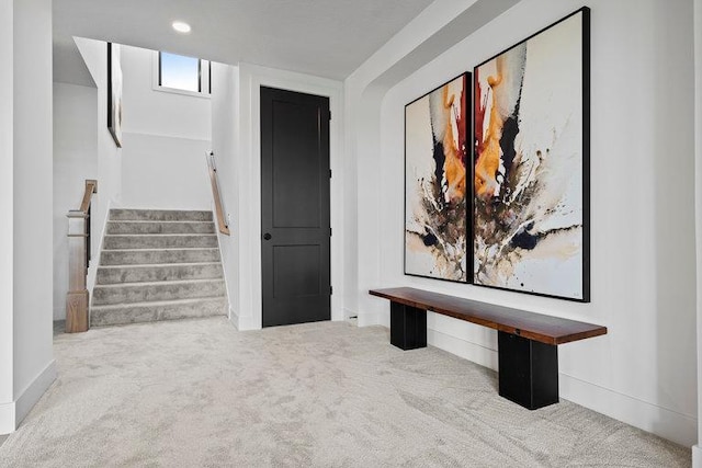 hallway featuring carpet flooring