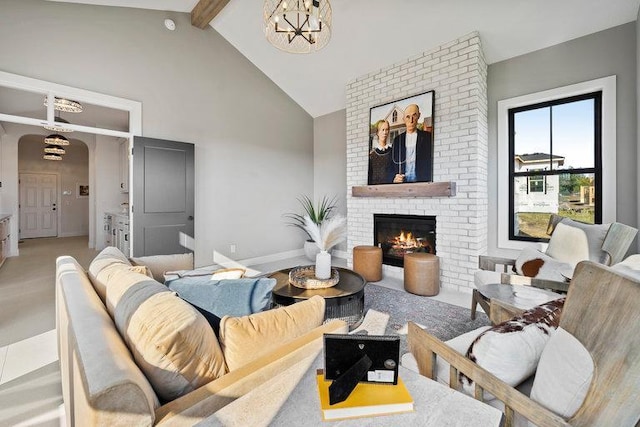 living area featuring arched walkways, a chandelier, beamed ceiling, a brick fireplace, and high vaulted ceiling