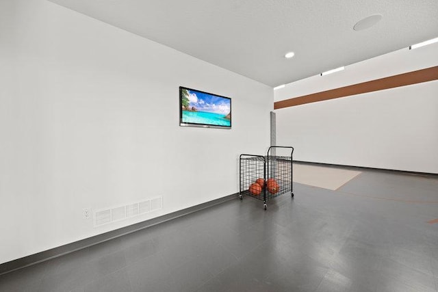 unfurnished room featuring visible vents and recessed lighting