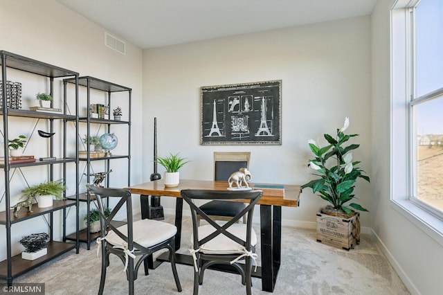 home office featuring light carpet