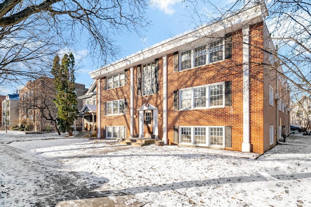 view of snow covered property