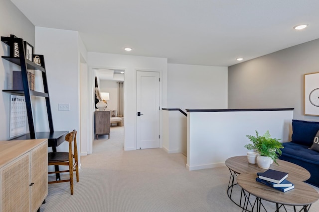 living room with light colored carpet