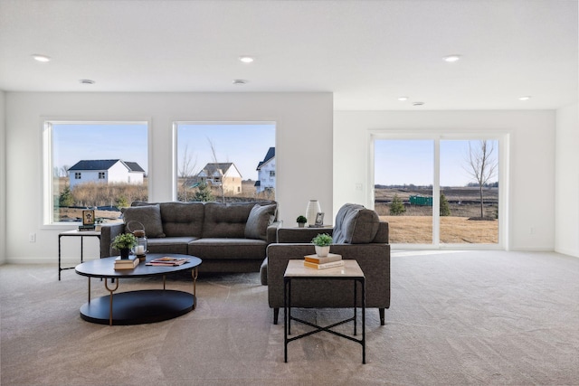 living room featuring light carpet