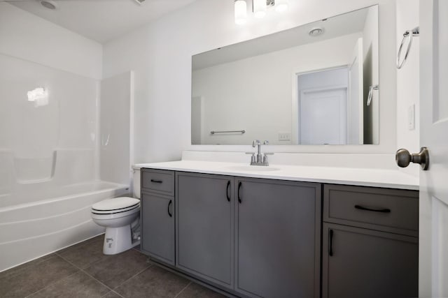 full bathroom with tile patterned floors, vanity, toilet, and bathtub / shower combination