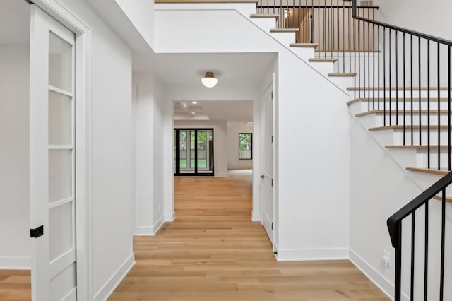 corridor featuring light wood-type flooring