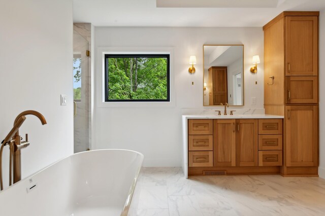 bathroom featuring plus walk in shower and vanity