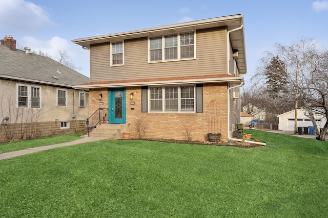 front facade featuring a front lawn