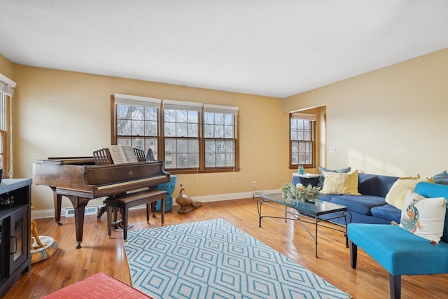 sitting room featuring light hardwood / wood-style floors