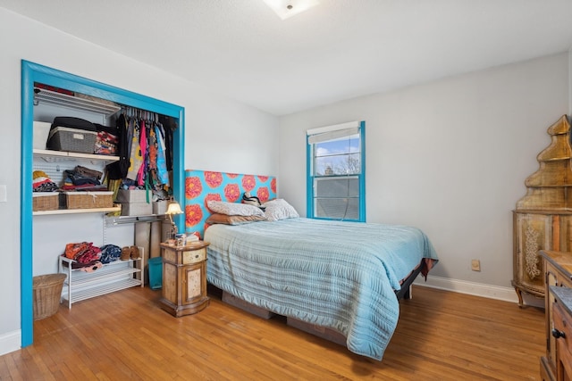 bedroom featuring wood-type flooring