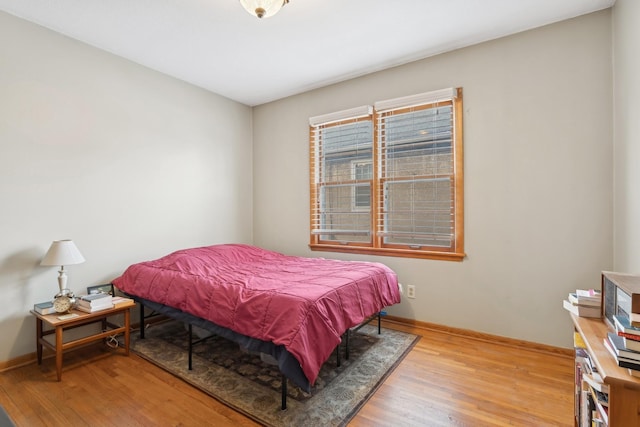 bedroom featuring light wood-type flooring