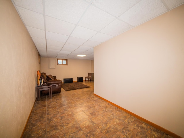 interior space featuring a drop ceiling