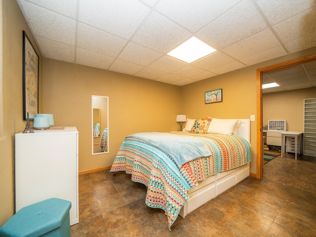 bedroom with a drop ceiling