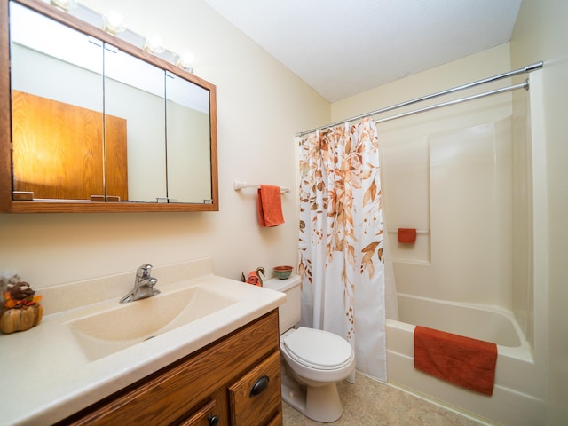 full bathroom with toilet, vanity, and shower / tub combo