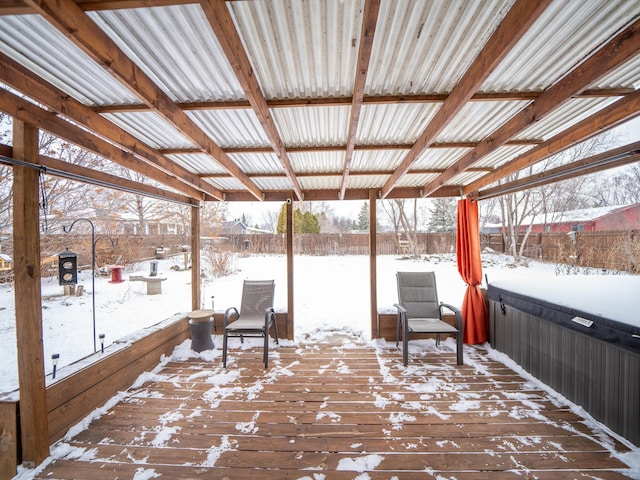 view of snow covered deck