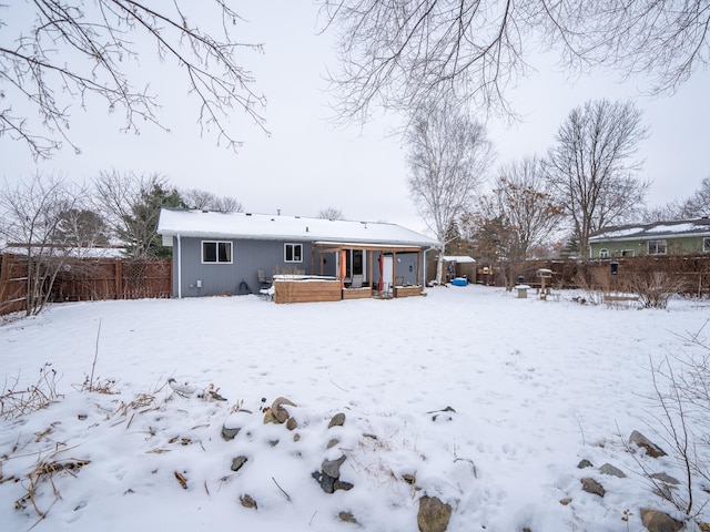 view of snow covered house