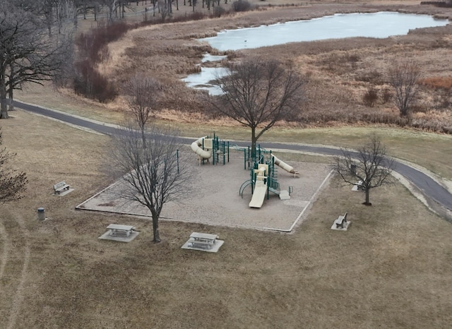 birds eye view of property with a water view