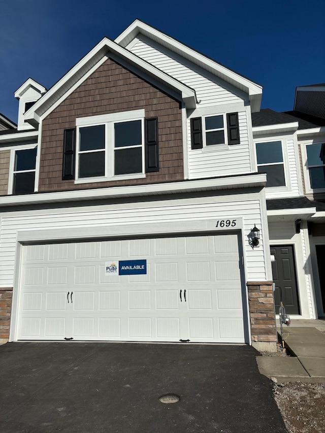 view of front of home with a garage