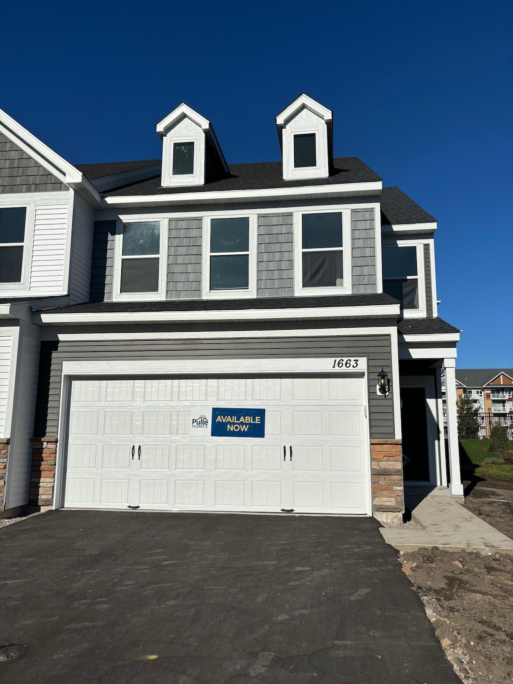 view of front of home with a garage