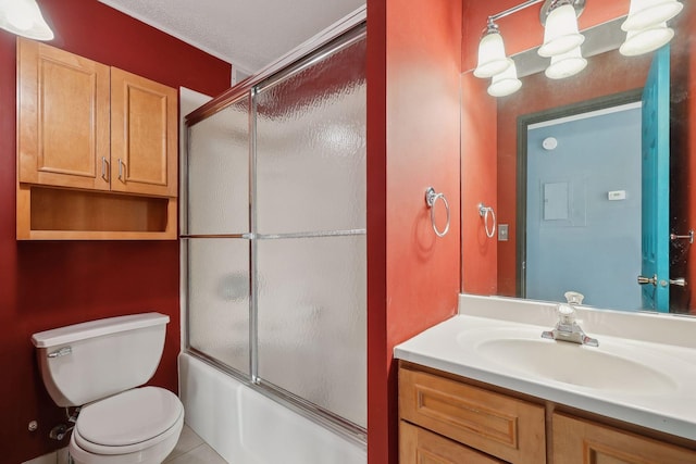 full bathroom with toilet, tile patterned floors, enclosed tub / shower combo, and vanity