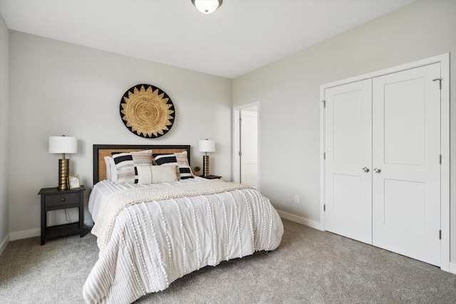 carpeted bedroom featuring a closet