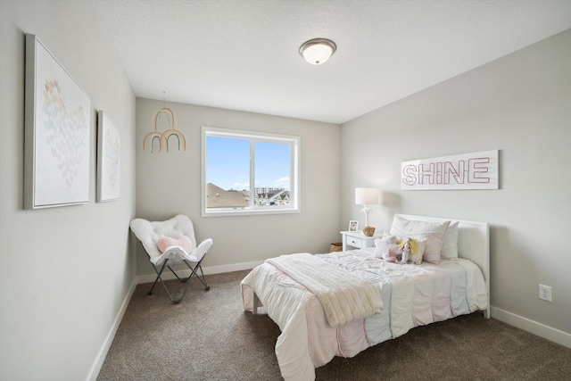 bedroom featuring dark colored carpet