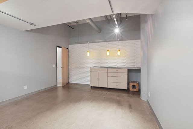 garage featuring baseboards