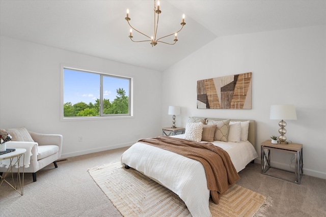 bedroom with an inviting chandelier, light colored carpet, and vaulted ceiling