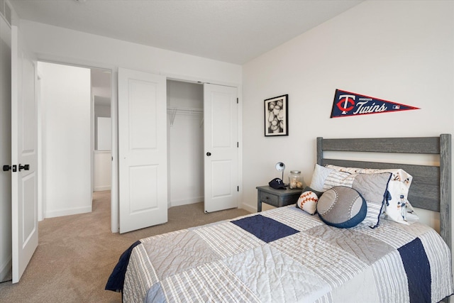 bedroom with carpet flooring and a closet