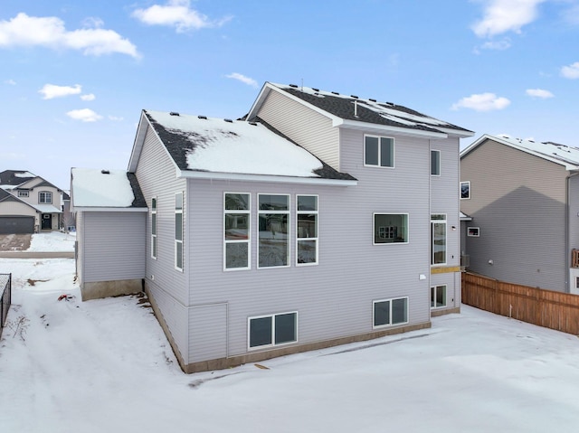 view of snow covered property