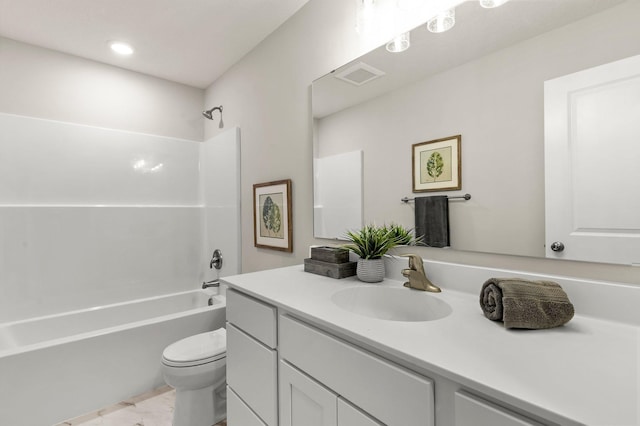 bathroom featuring visible vents, vanity, washtub / shower combination, and toilet