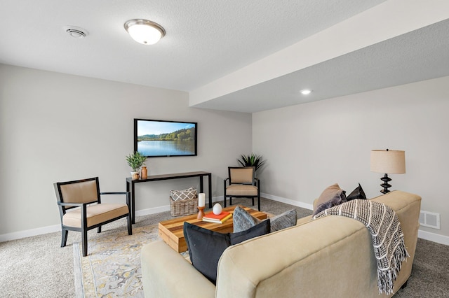 living area featuring carpet floors, visible vents, and baseboards