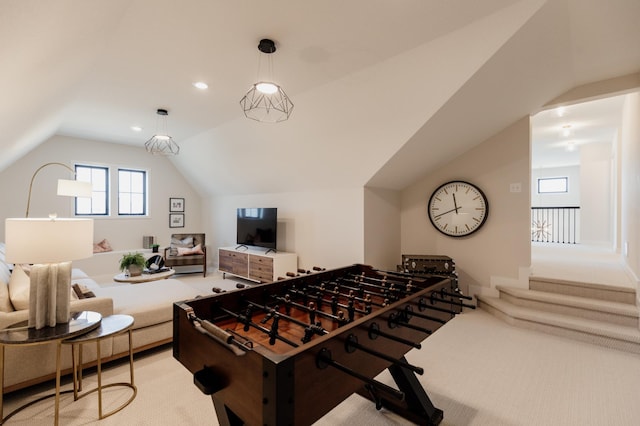 playroom with light carpet and lofted ceiling