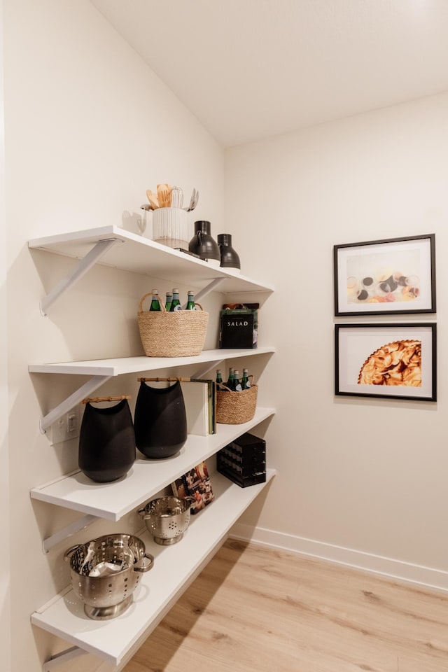 mudroom featuring wood-type flooring